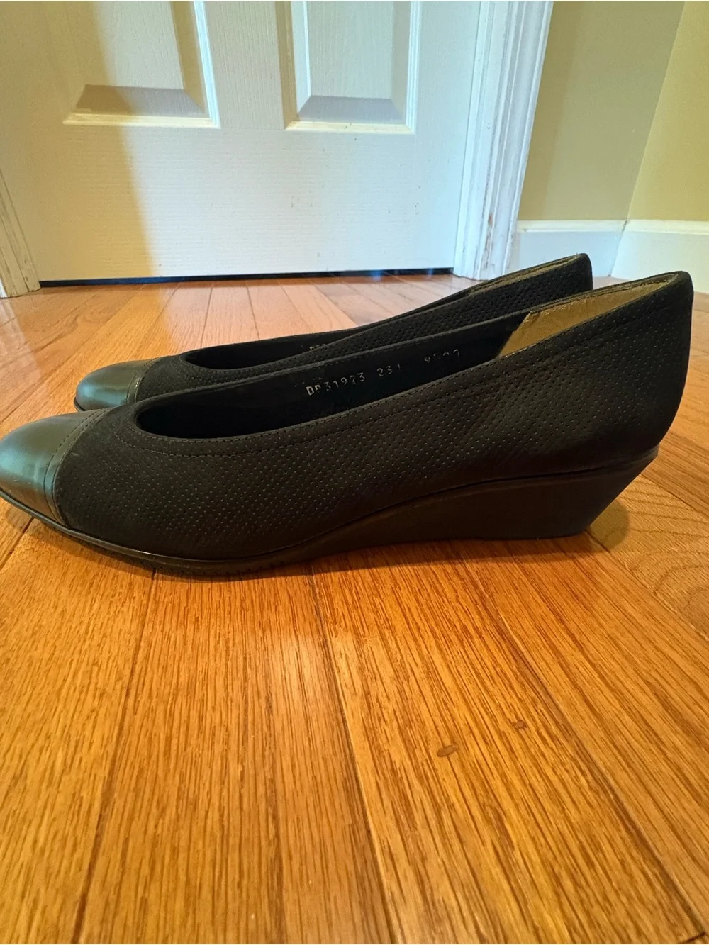 Salvatore Ferragamo Black Slightly Wedged Pumps with Glossy Black Patent Cap Toe